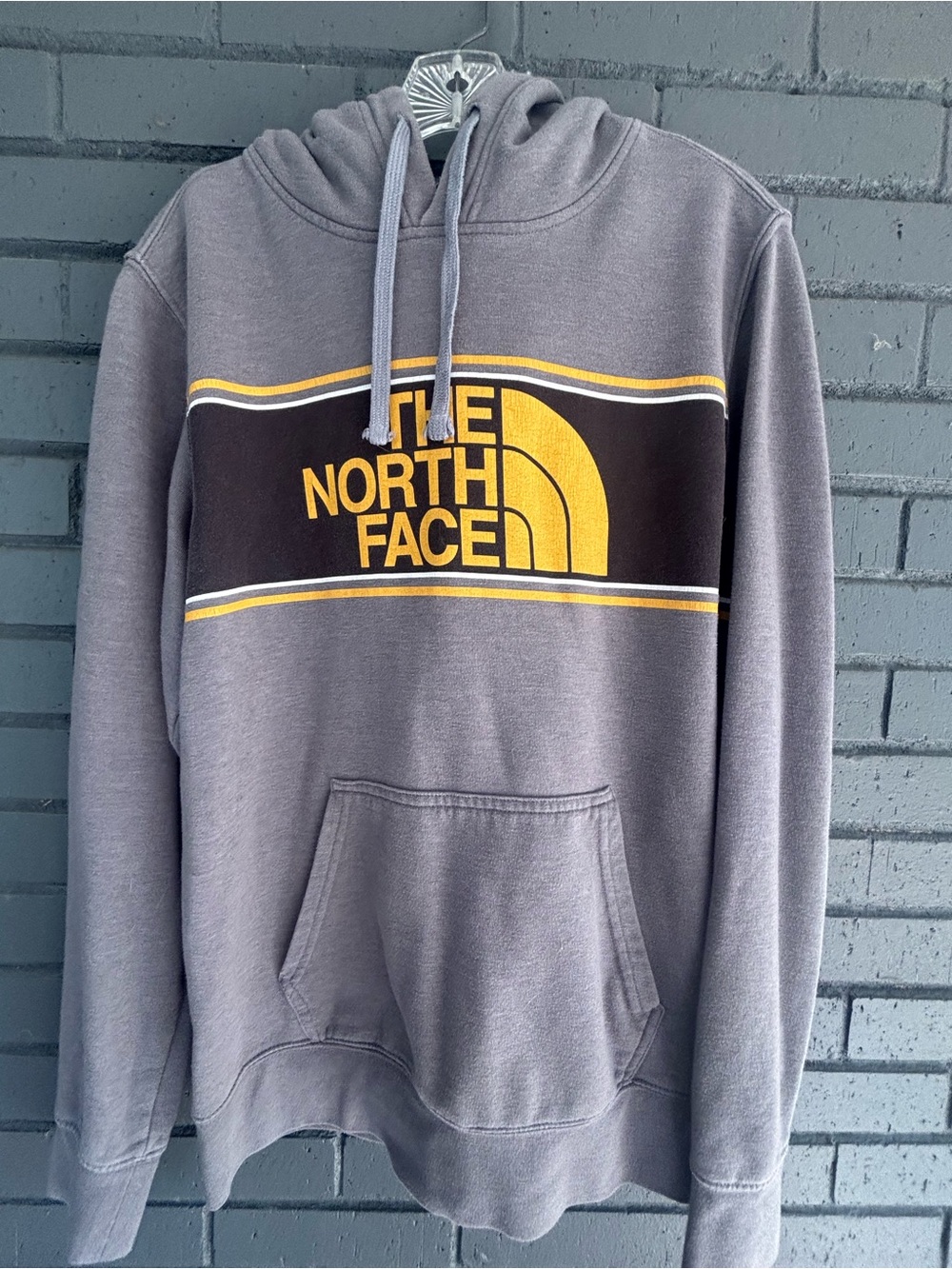 The North Face Gray Hoodie with Yellow Logo Stripe